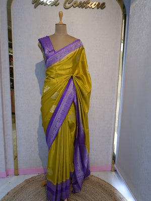 Yellow saree with purple border