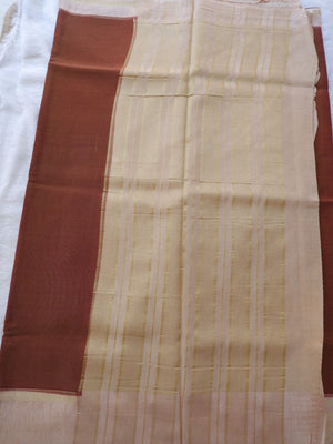 Fabric with a brown and beige pattern