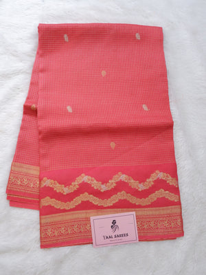 Red saree with gold patterns