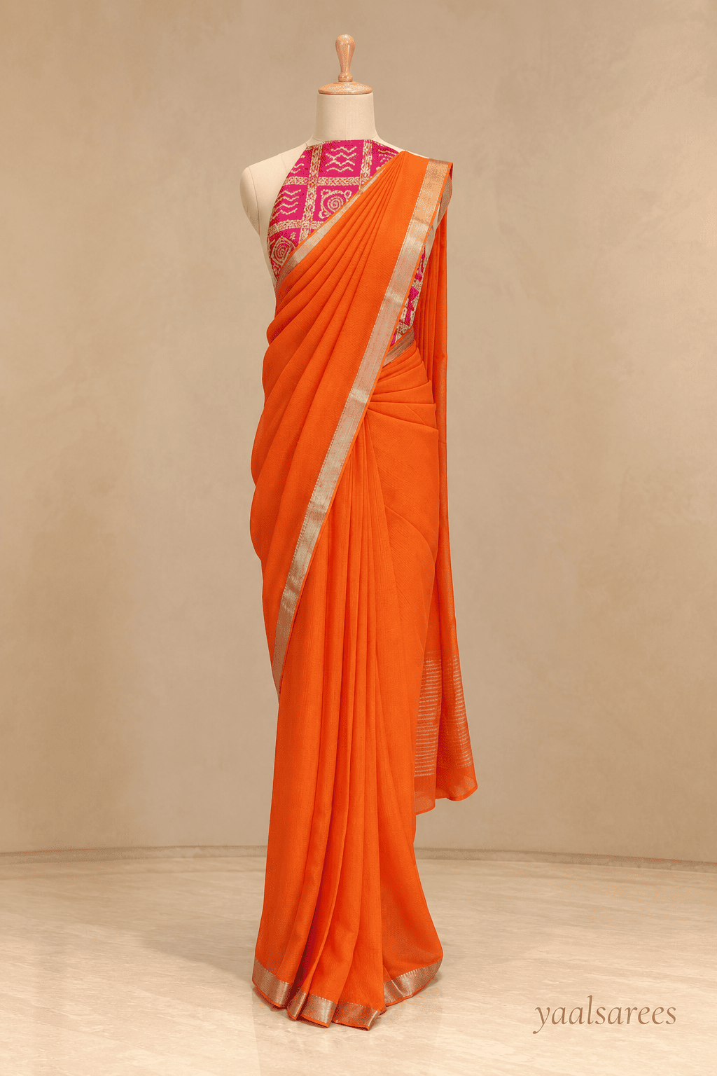 Chinnon Lines Orange Saree with Pink Blouse