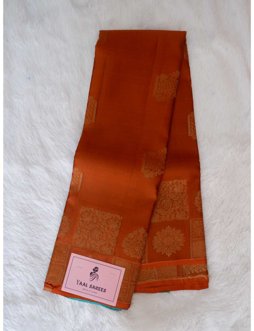 Rust & Rama Green Pure Silk Saree