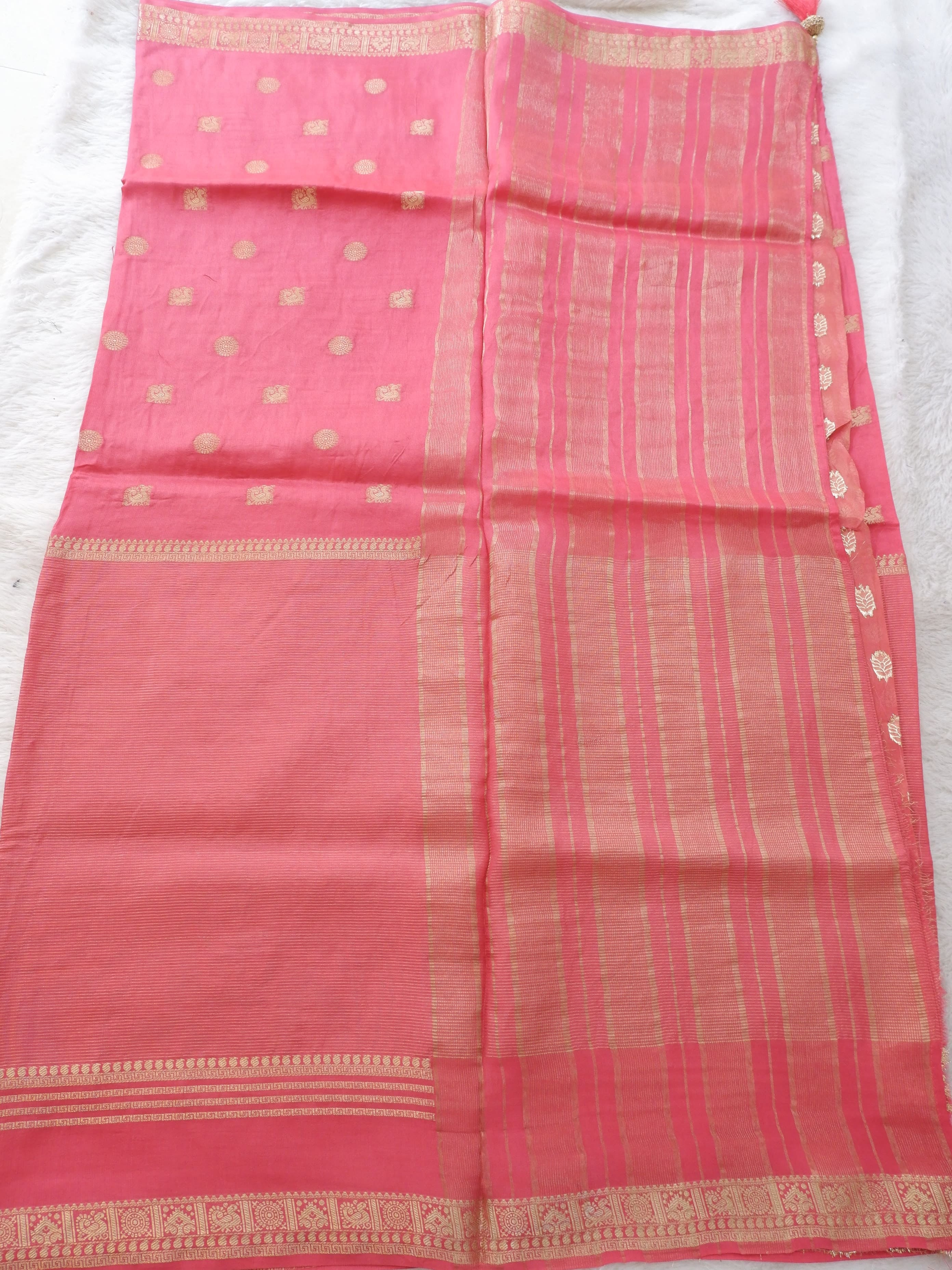 Pink saree with a patterned border