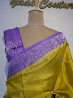 Yellow saree with purple border