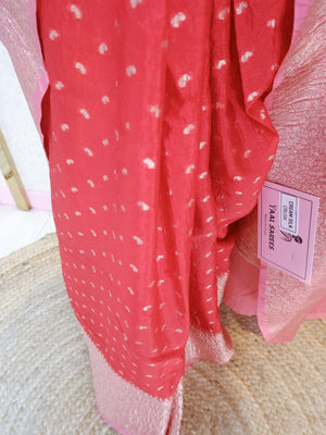 Red saree with white patterns