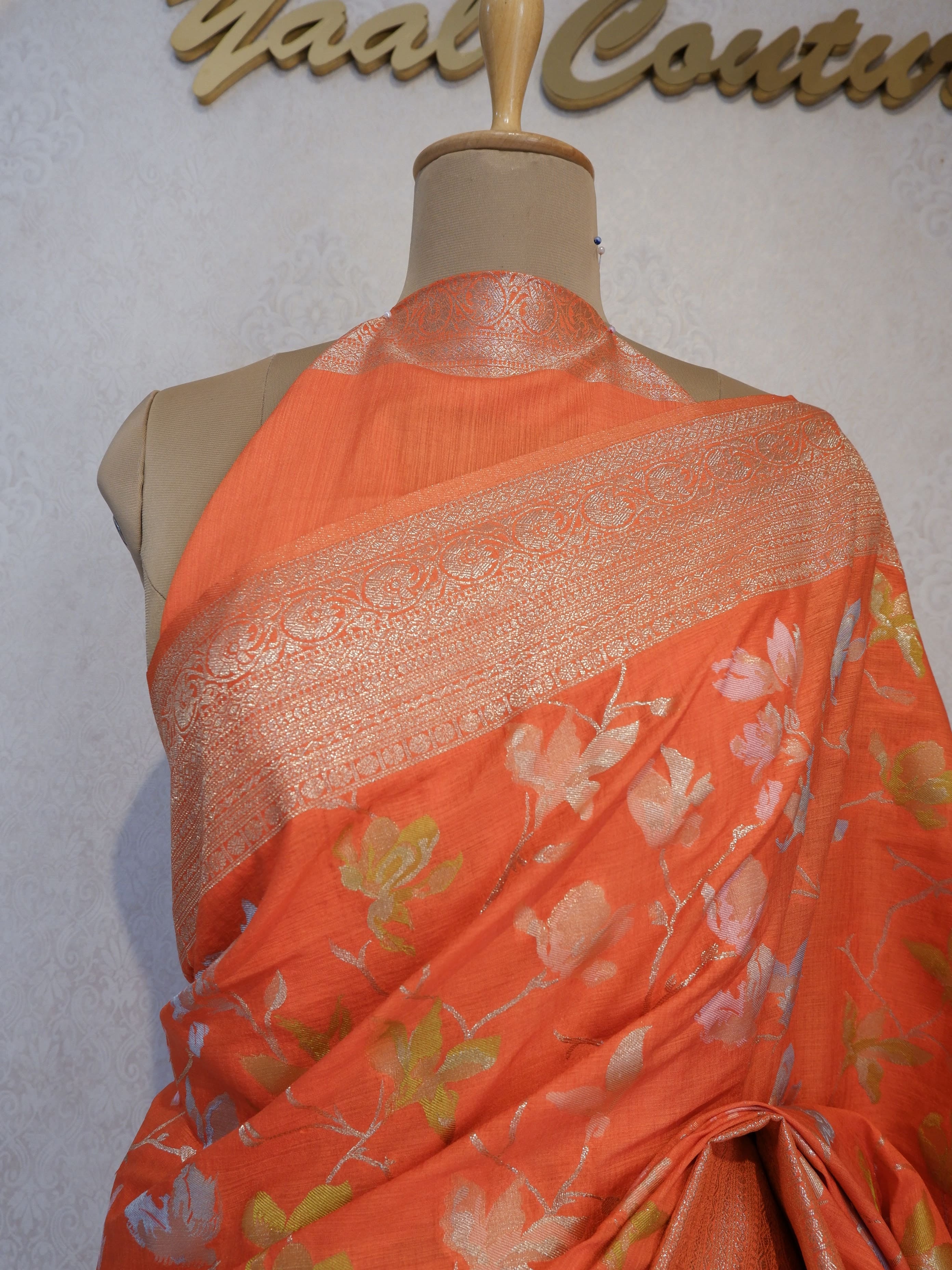 Orange fabric with floral patterns