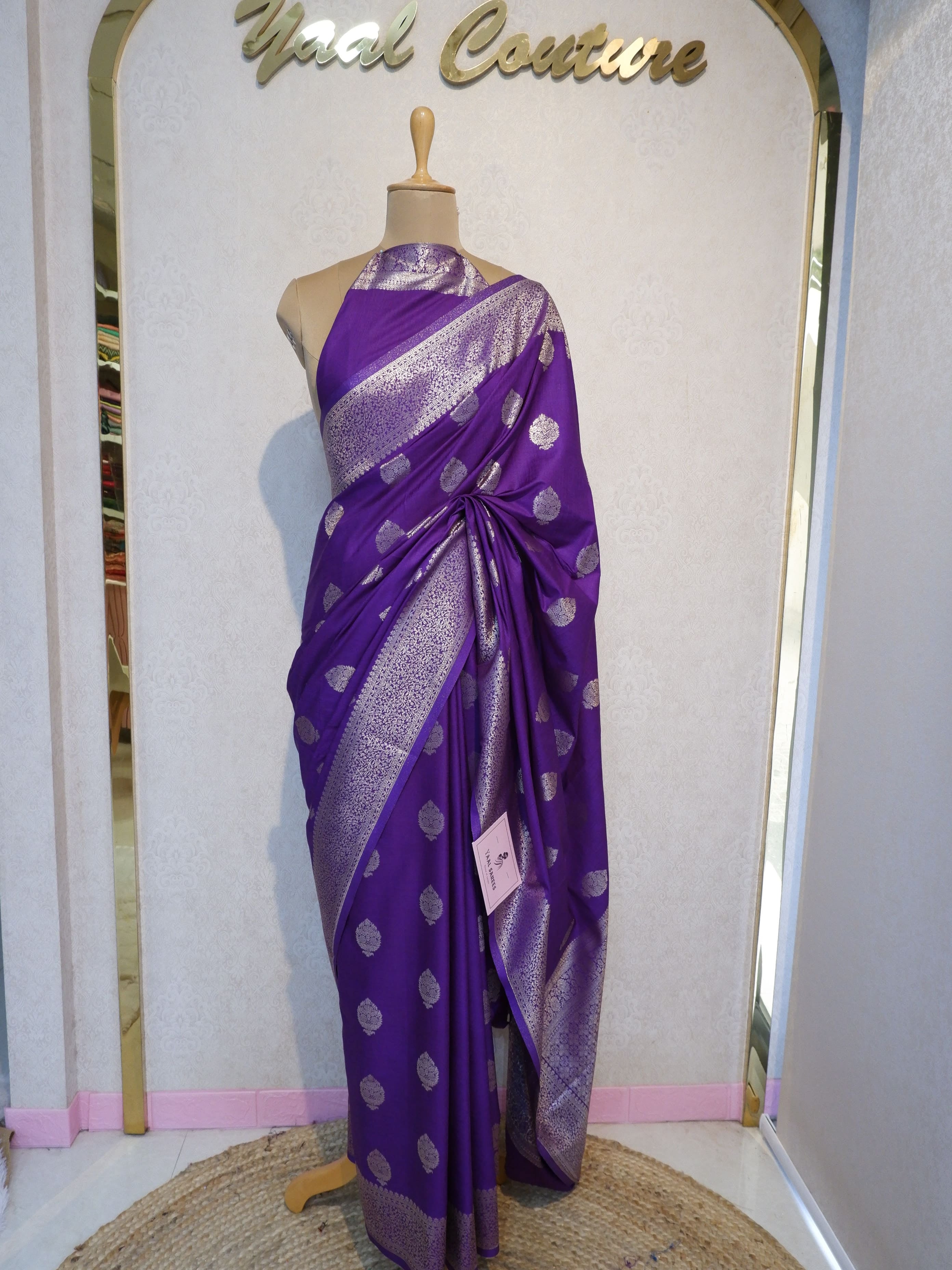 Purple fabric with silver polka dots