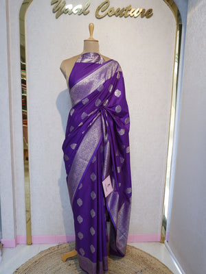 Purple fabric with silver polka dots