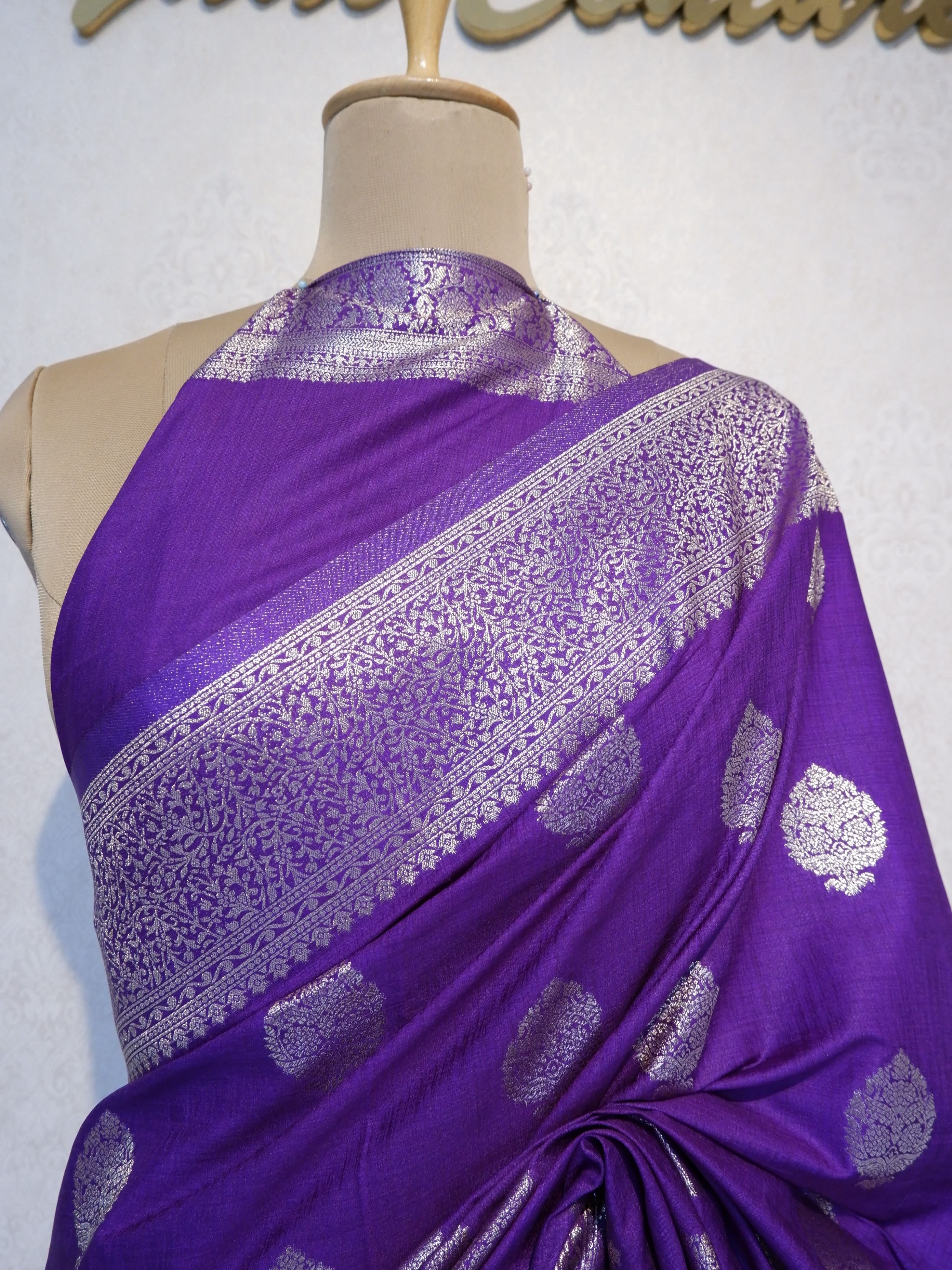 Purple fabric with silver patterns 