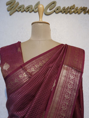 Maroon saree with gold patterns