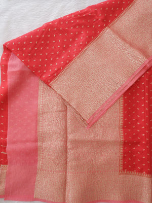 Red and gold saree with intricate patterns 