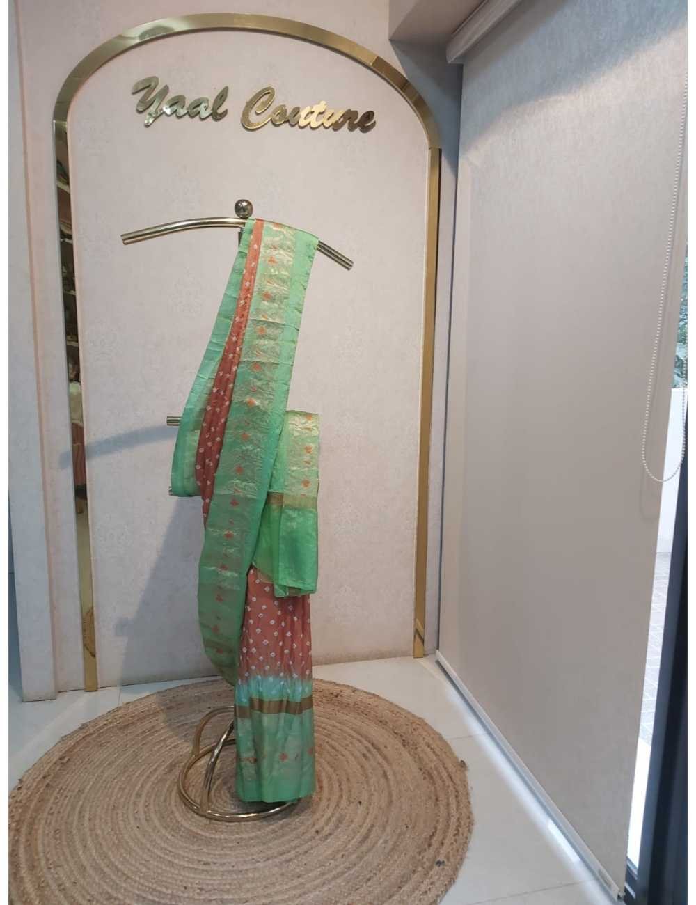 Bandhini in Rust Colour with Green Border