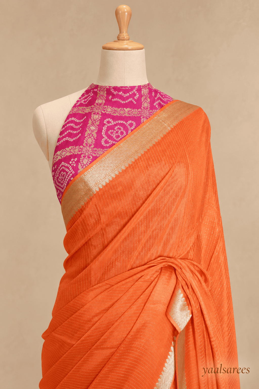 Chinnon Lines Orange Saree with Pink Blouse