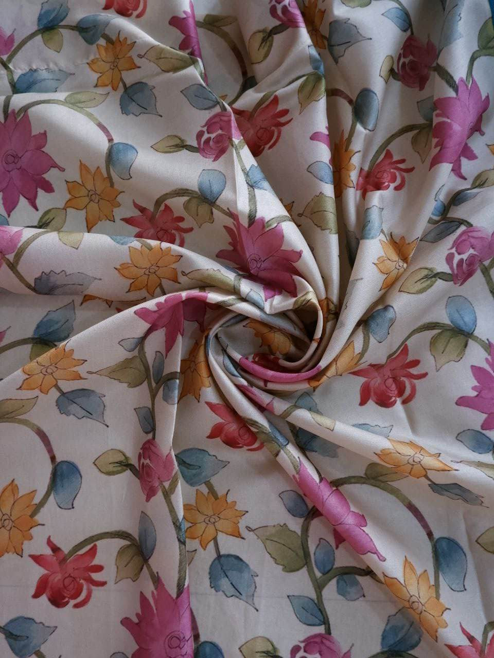 Floral patterned fabric with pink, blue, and orange flowers 